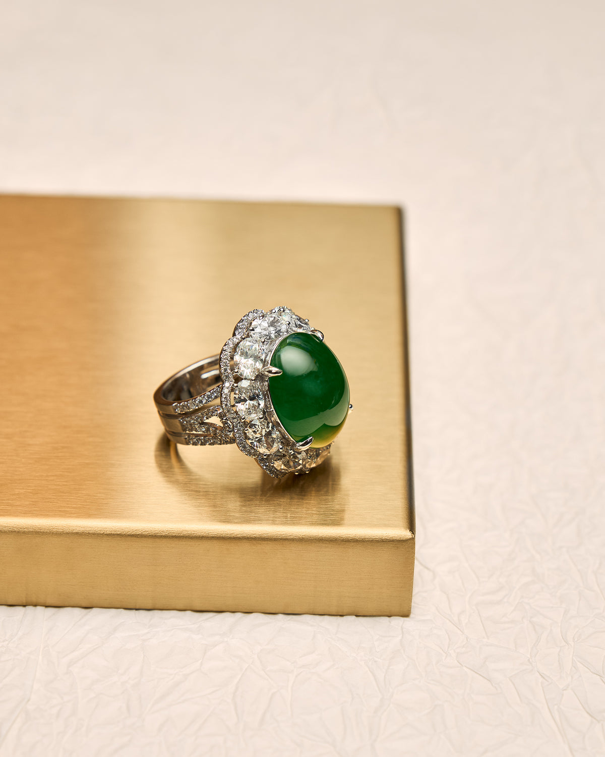 Lateral profile of The Oval Cabochon Ring highlighting the elevated double-convex dome, the substantial depth of the diamond setting, and the three-quarter pavé band.
