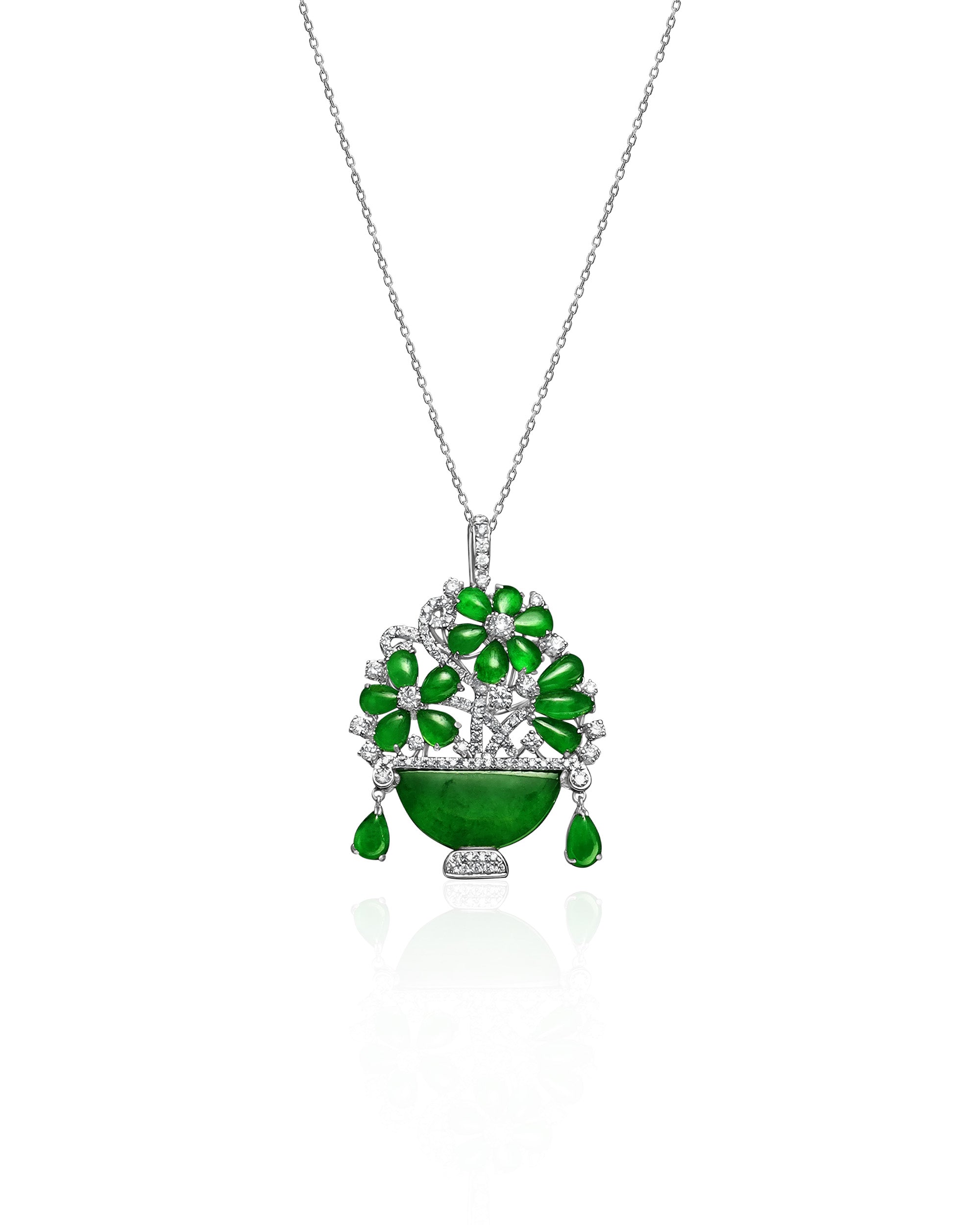 Front view of The Floral Pendant featuring oval and pear-shaped jadeite cabochons and pavé diamond stems, displayed against a white background.